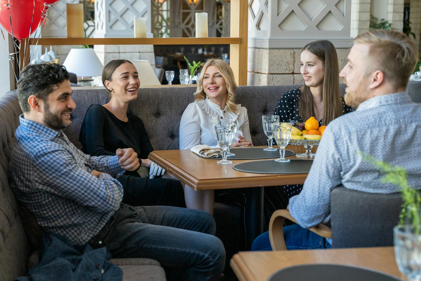 Group of People having a Meeting on a Restaurant